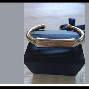 COACH Women’s silver open bangle